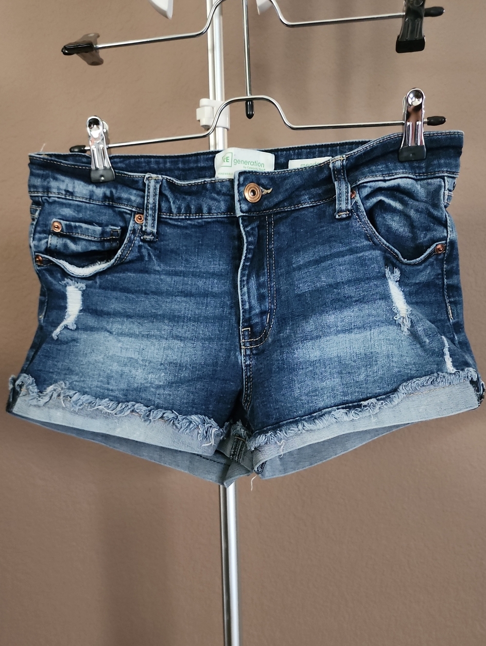 Women's distressed dark blue denim cutoff shorts by Celebrity Pink